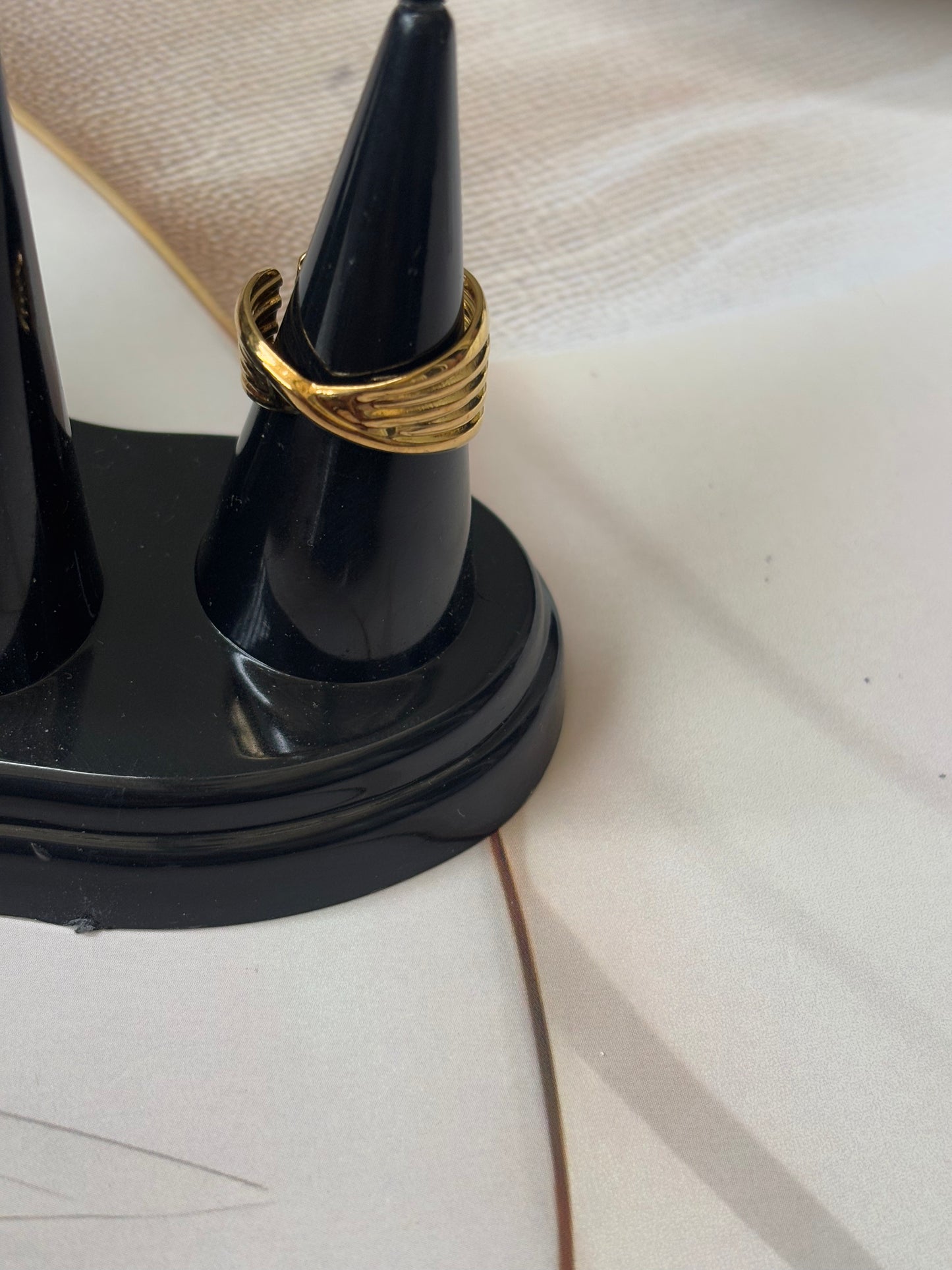 Broad criss cross ring