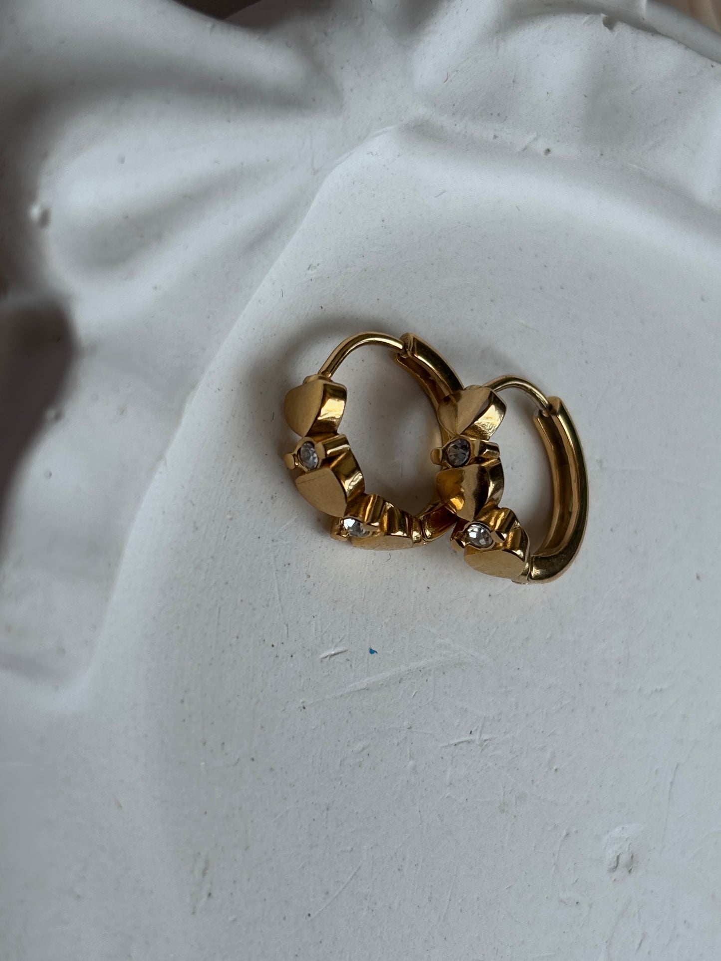Heart button huggie earrings