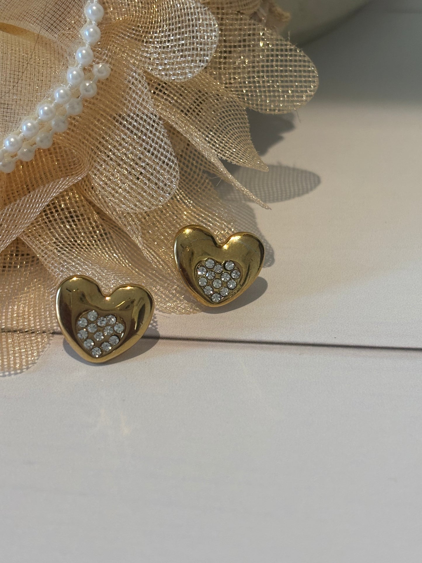 Golden Heart shape stud with AD stones