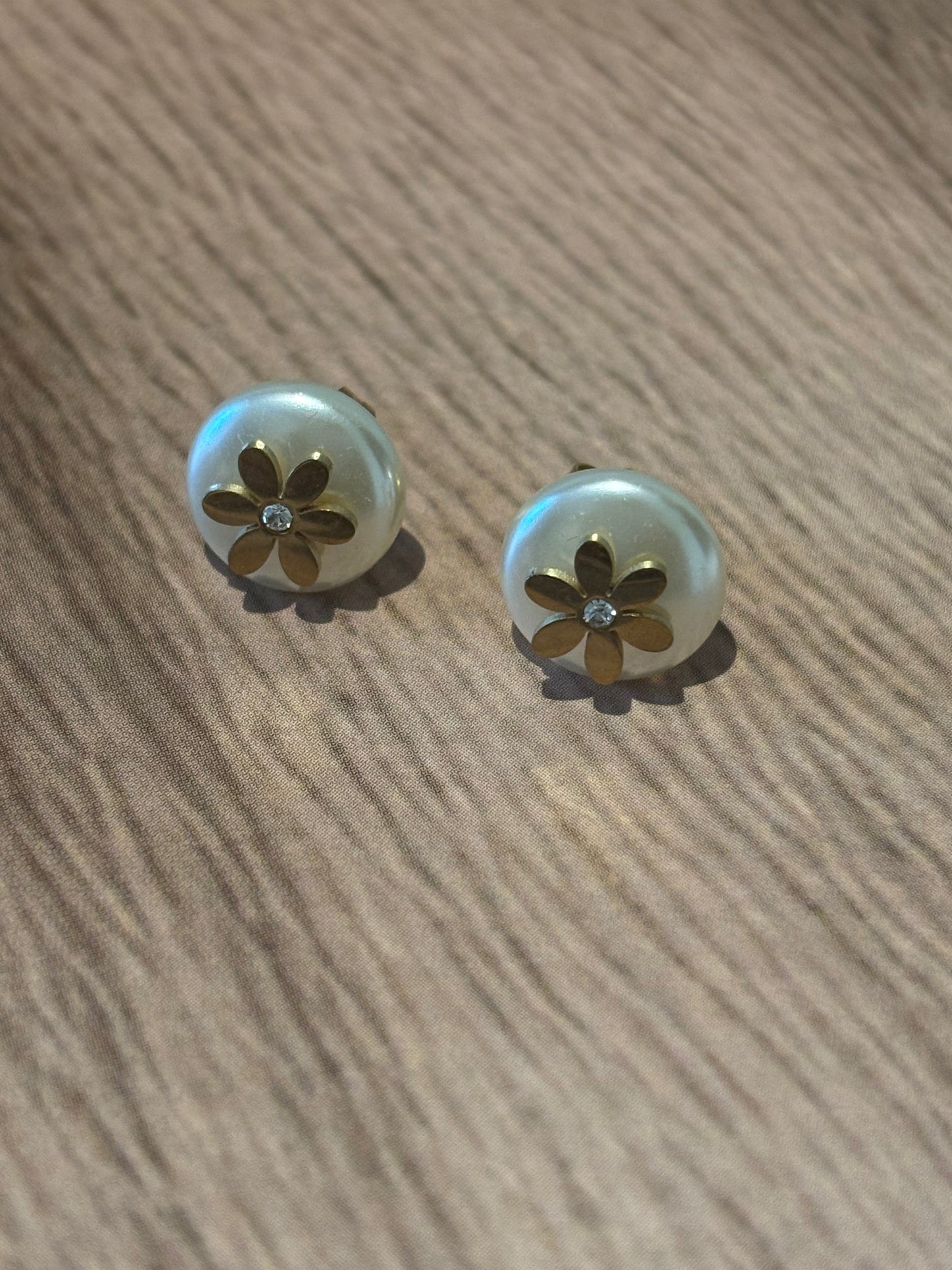 White stud with flower
