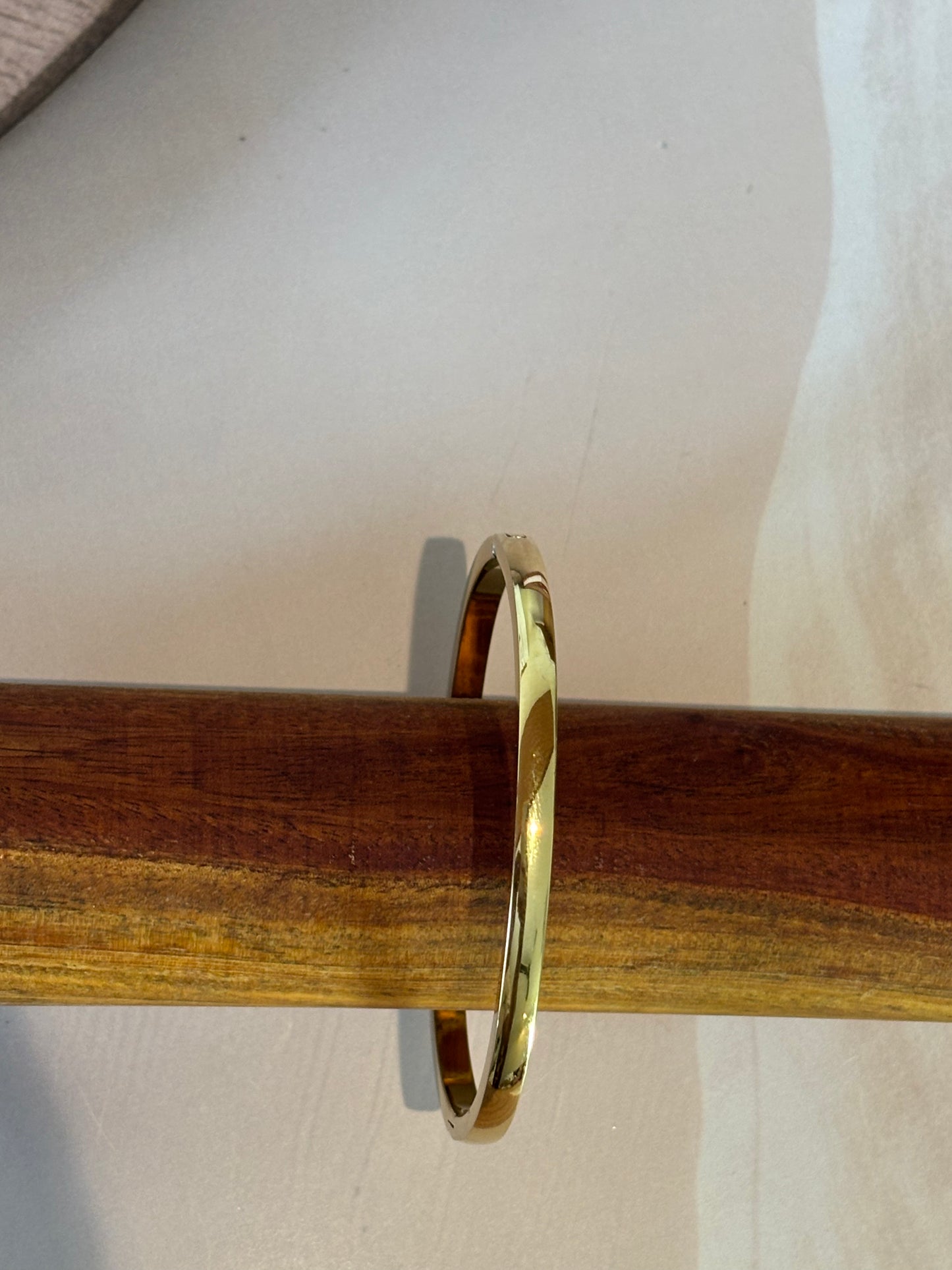 behind my watch , plain bracelet
