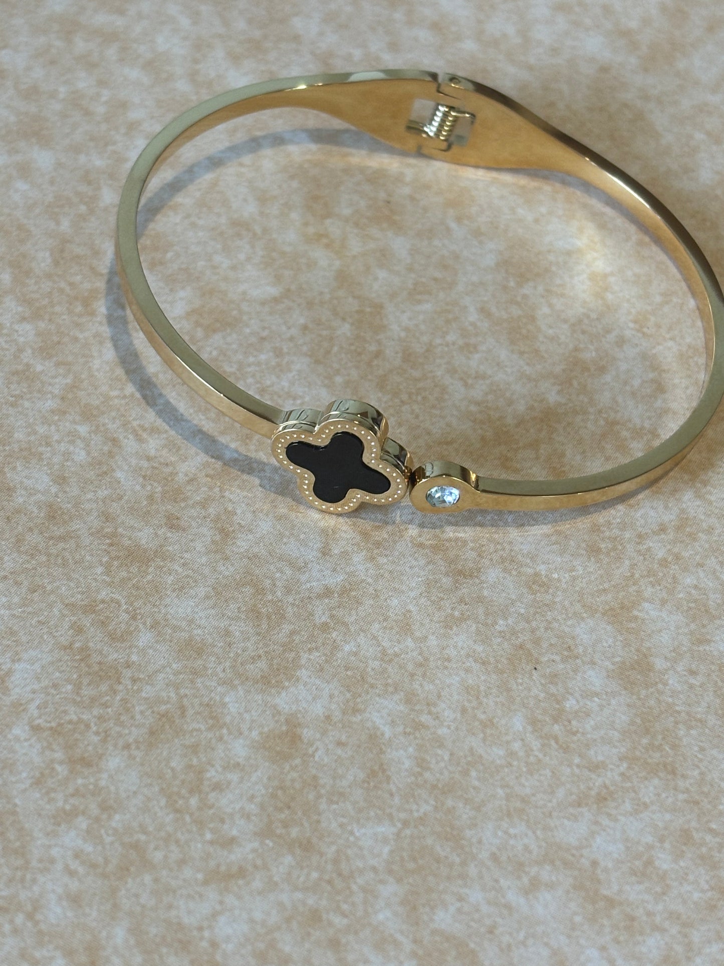 Golden clover leaf bracelet ,black