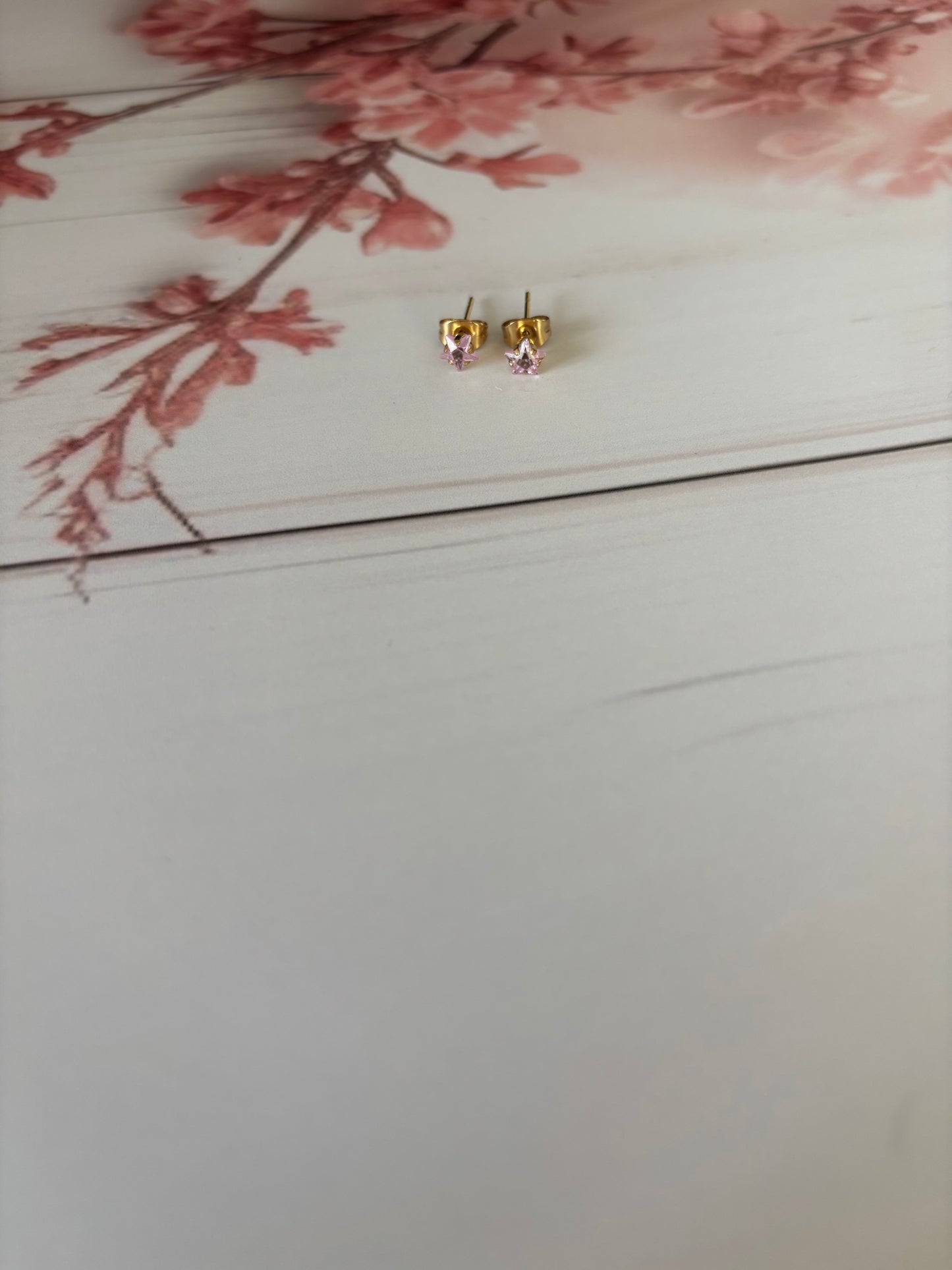 Tiny star studs, baby pink