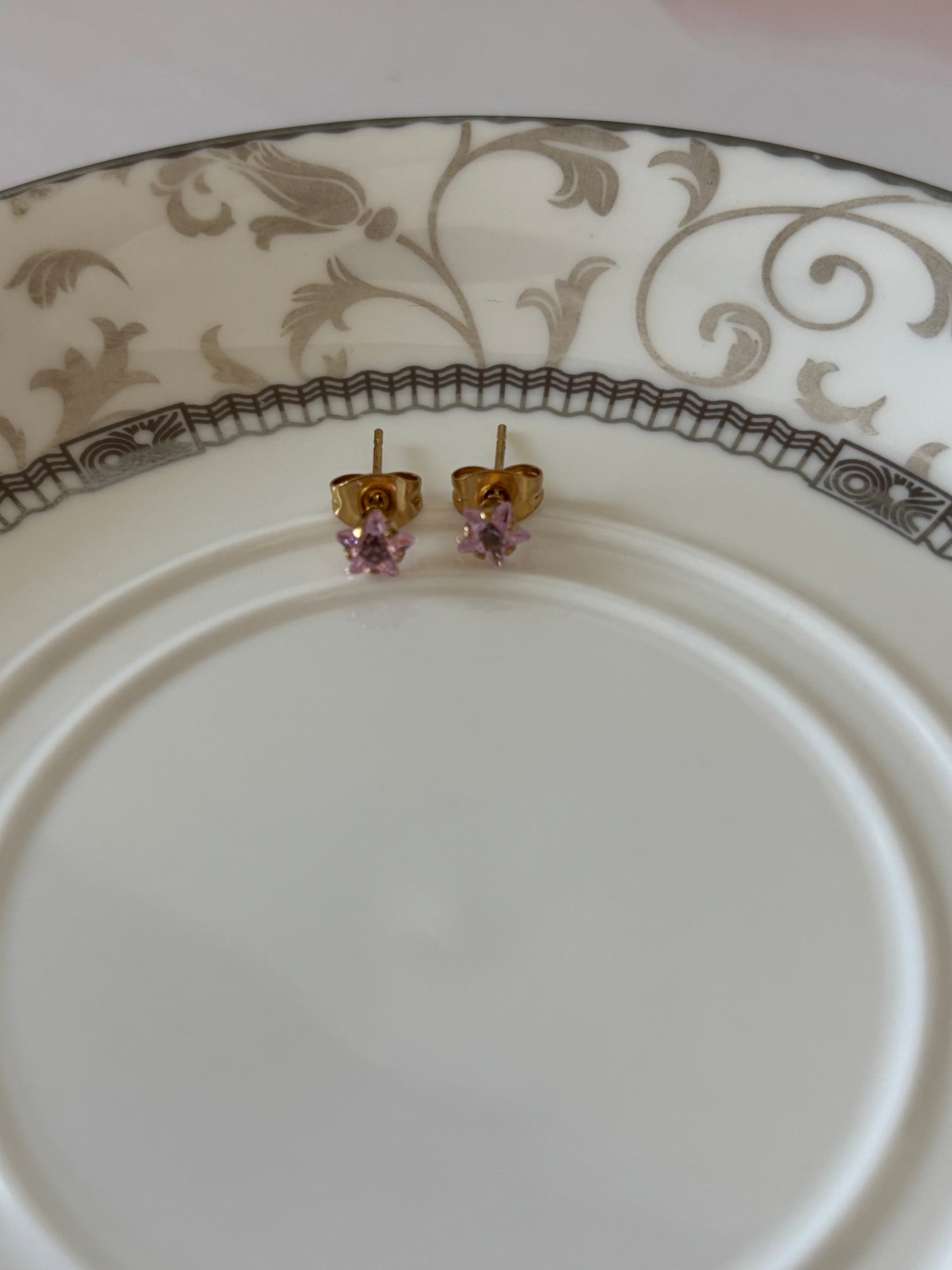 Tiny star studs, baby pink