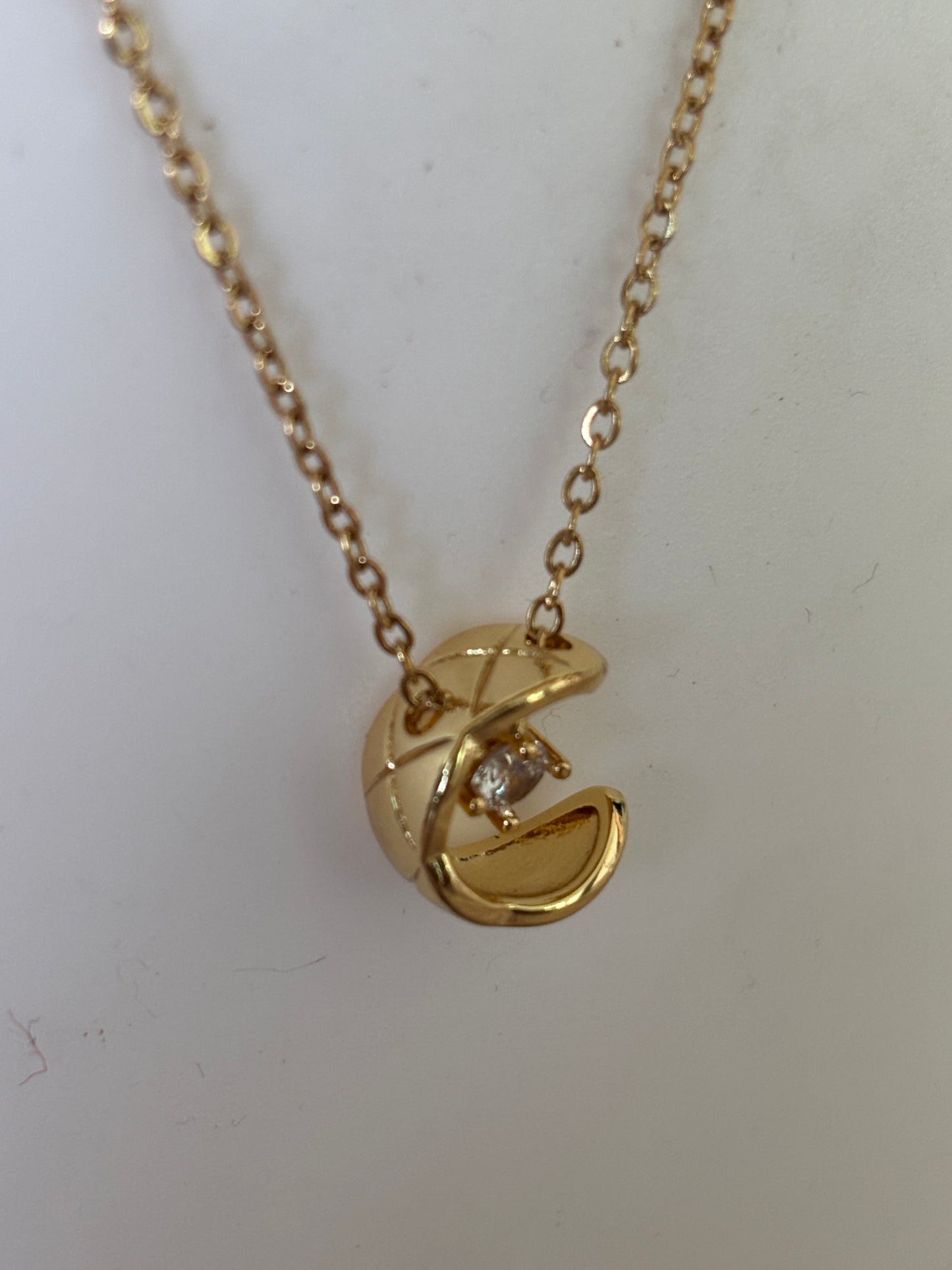 Golden half moon pendant necklace