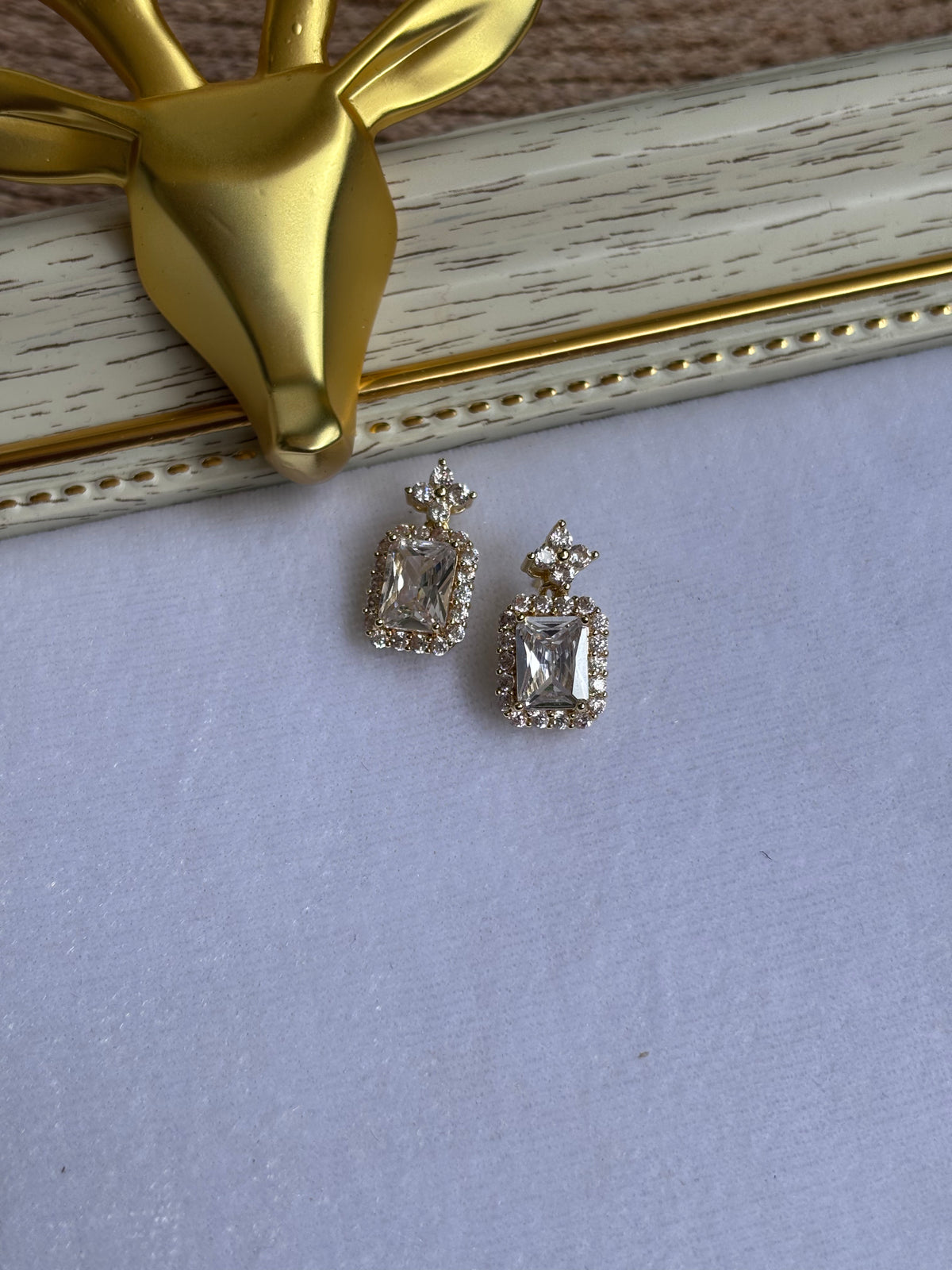 Crystal Studs with AD stones surrounded dangle stone