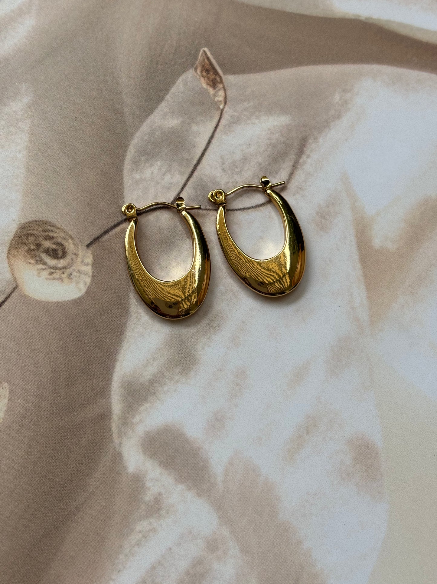 Golden Oval narrow hoops.