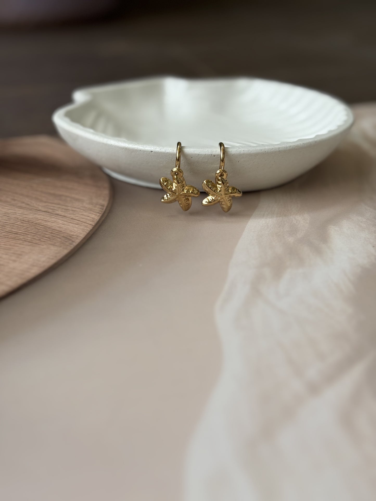Golden starfish earrings