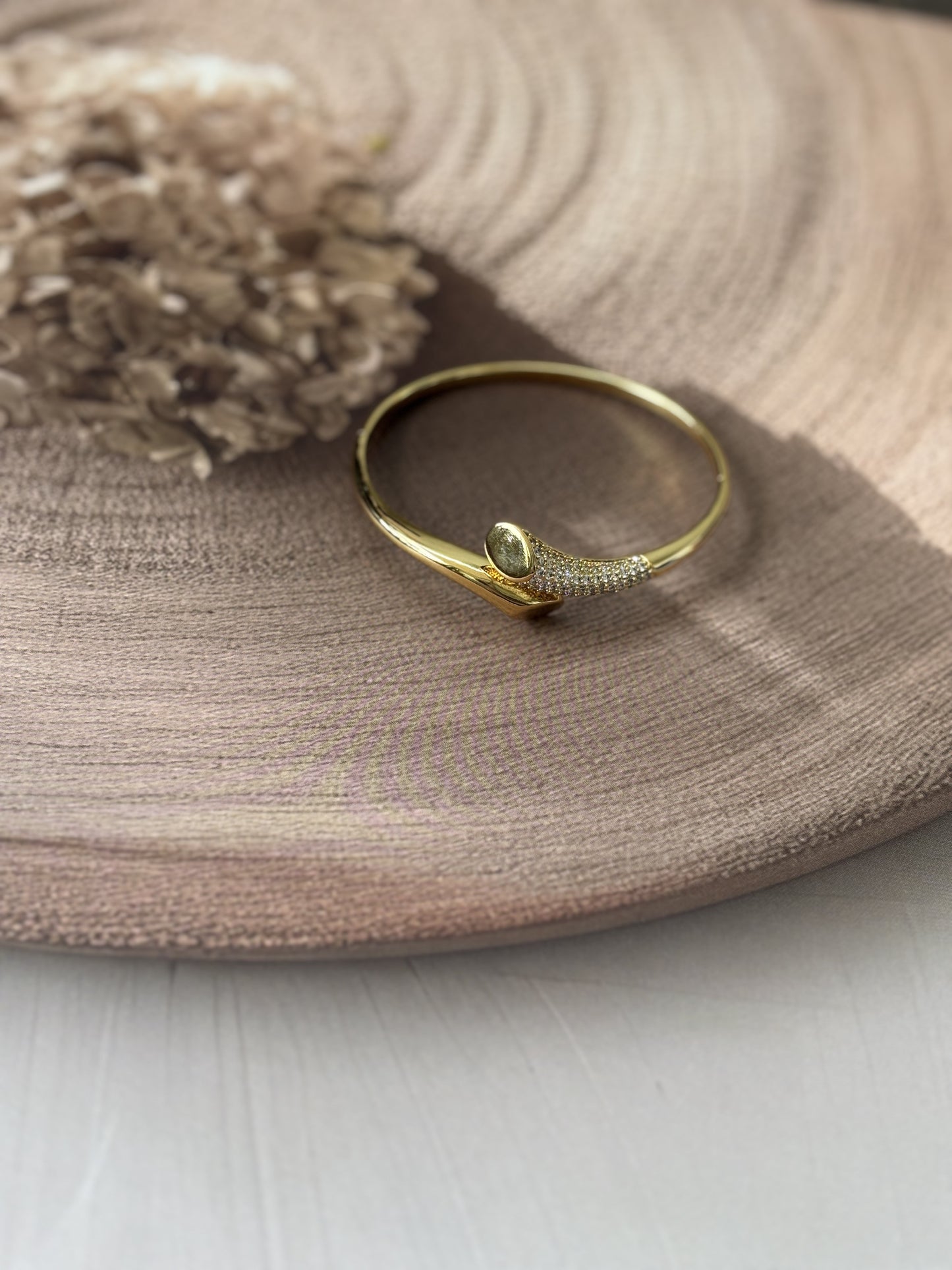 Golden AD studded bracelet