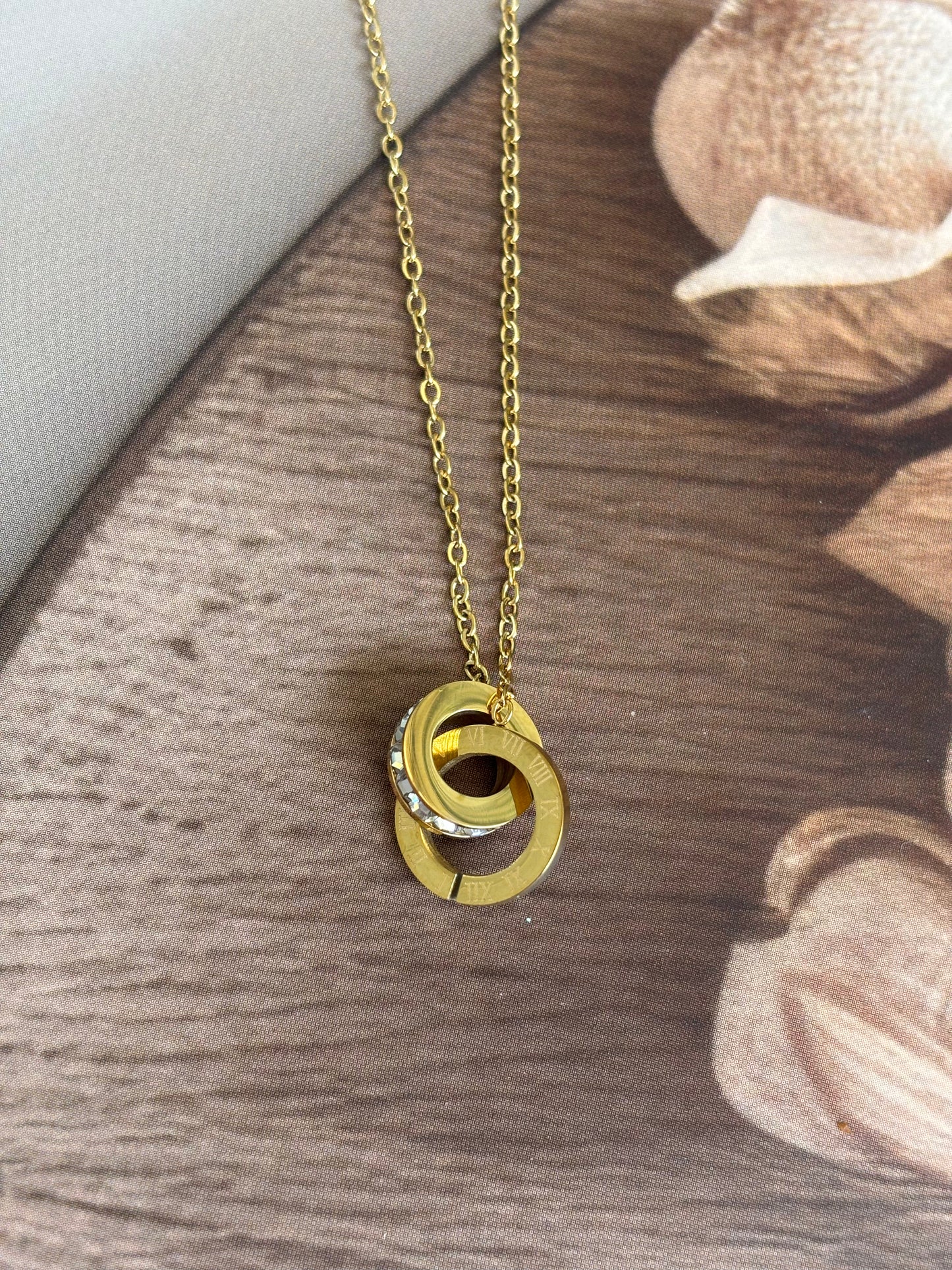 Golden Roman Intercept Necklace design