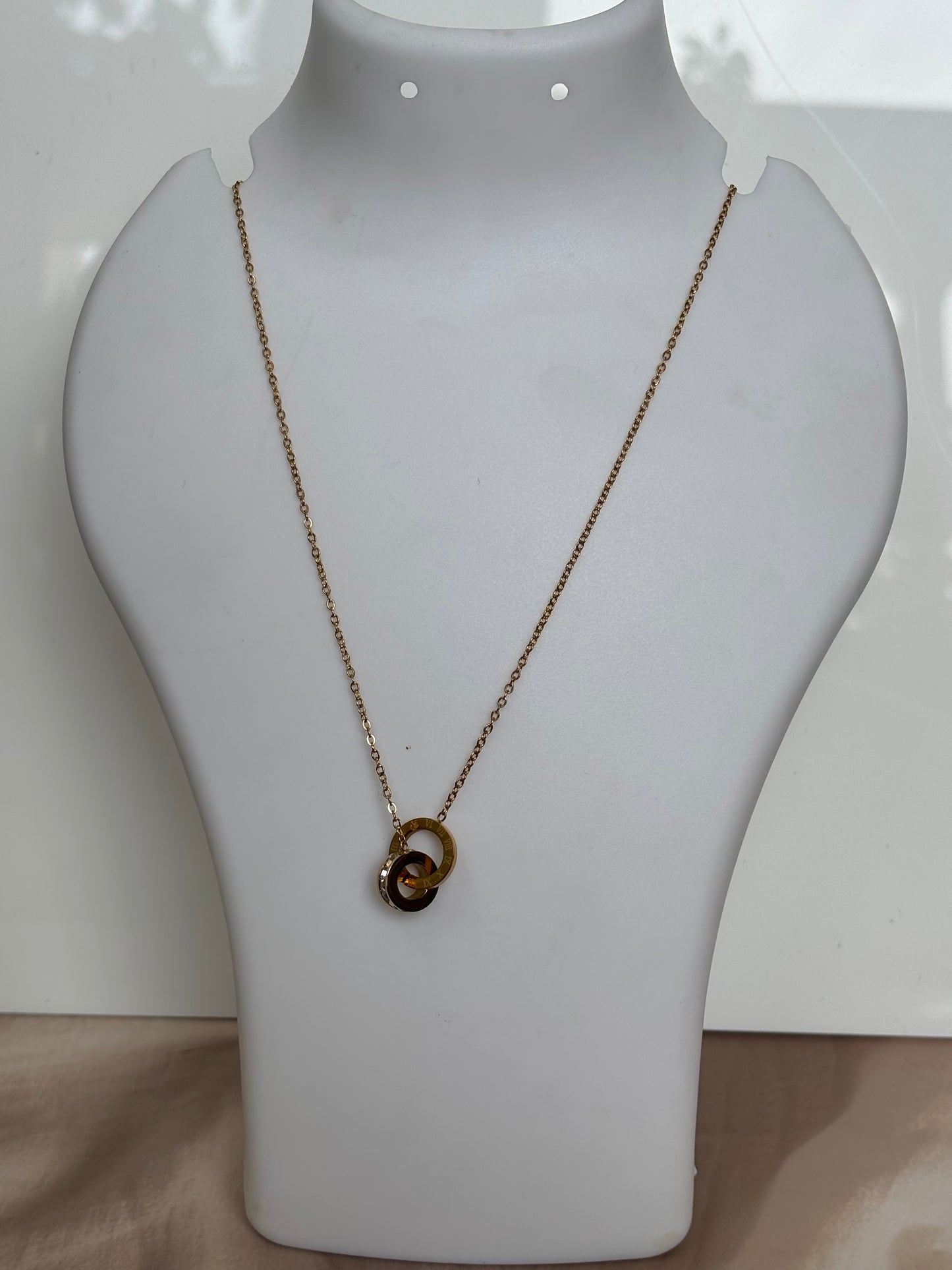 Golden Roman Intercept Necklace design