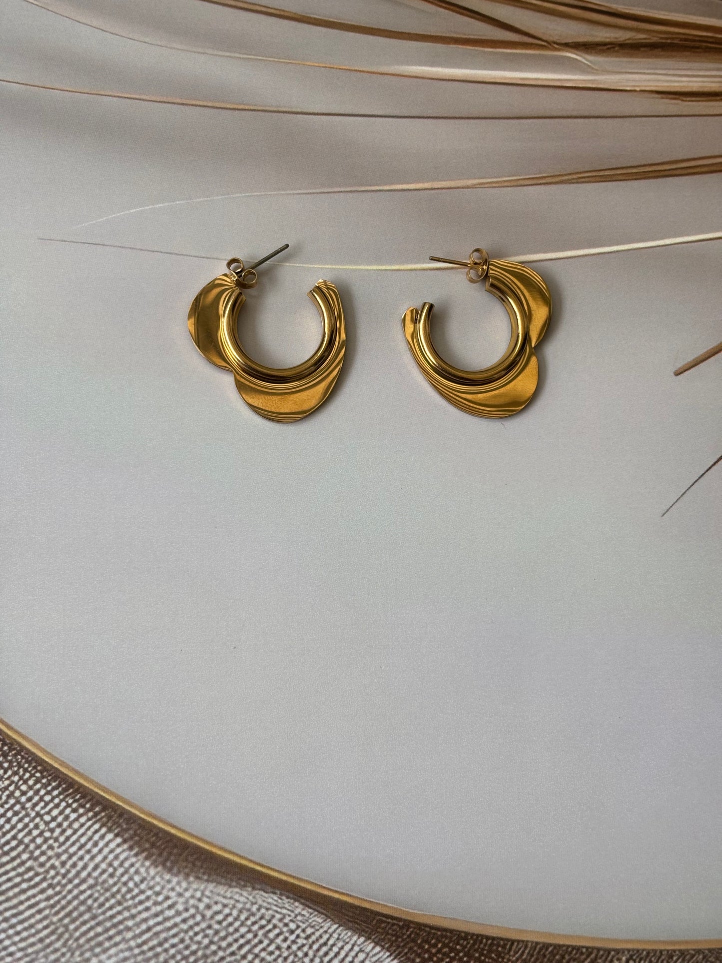 Golden Half heart shape earrings