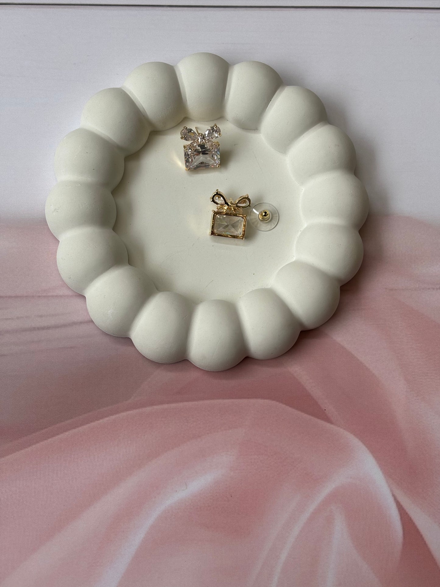 Golden bow gift studs
