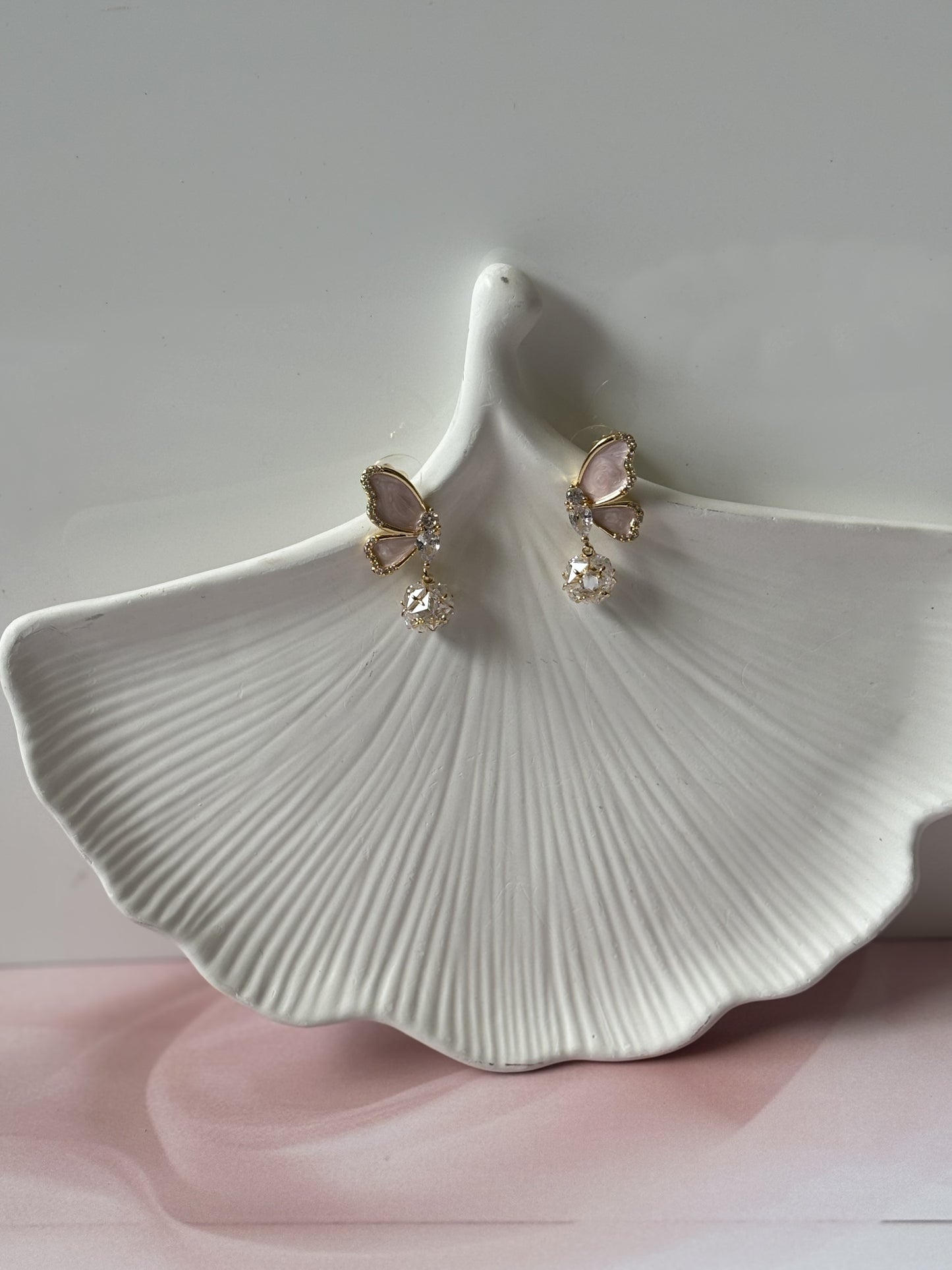 Pink half butterfly dangler earrings