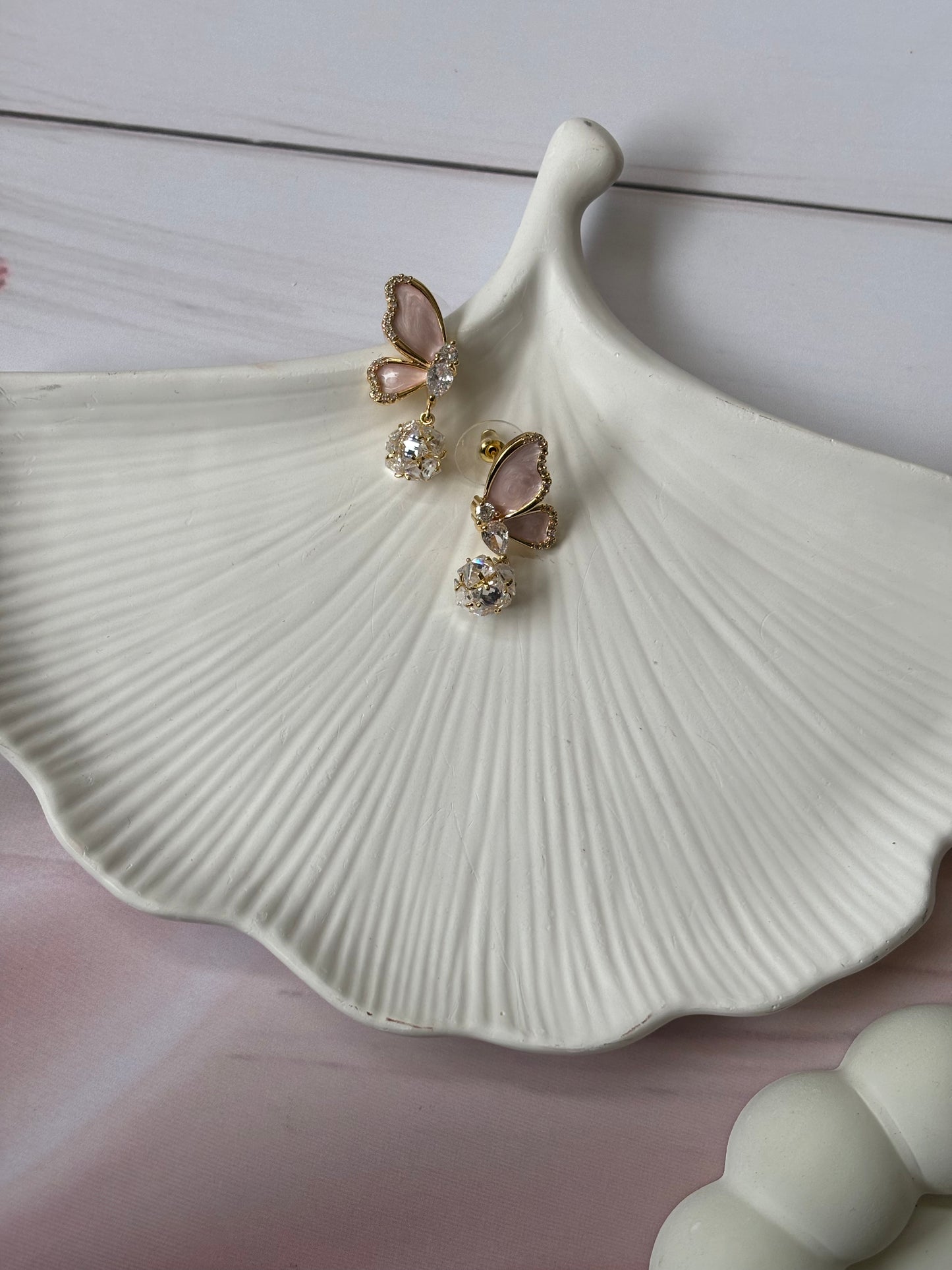 Pink half butterfly dangler earrings