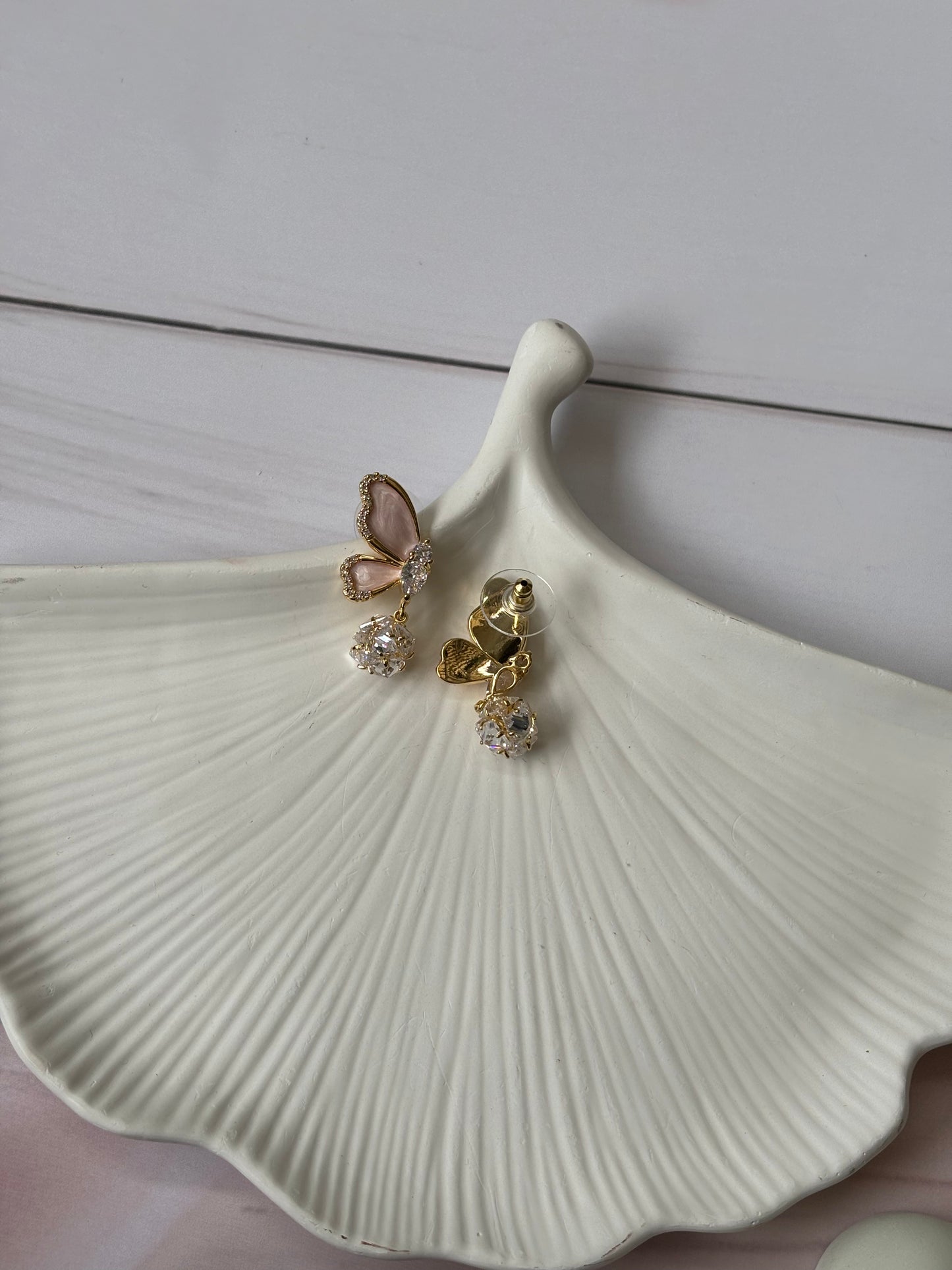 Pink half butterfly dangler earrings