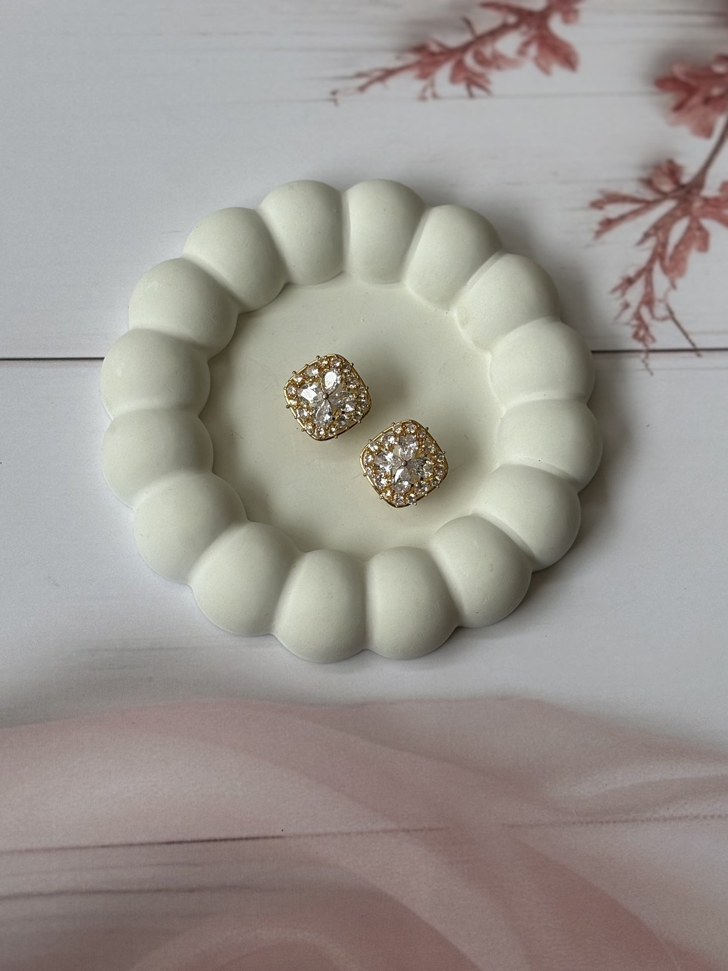 AD clip-on earrings