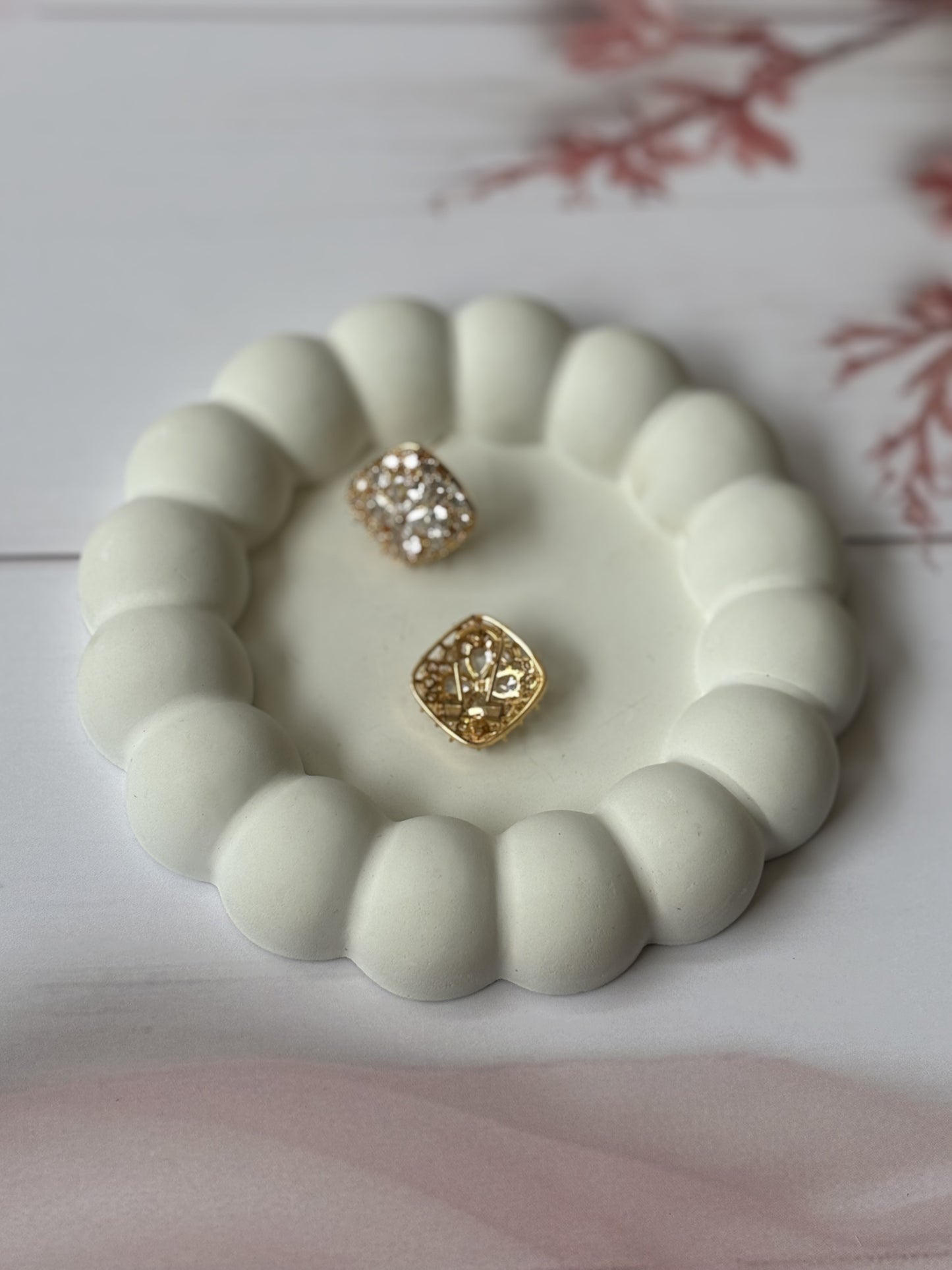 AD clip-on earrings