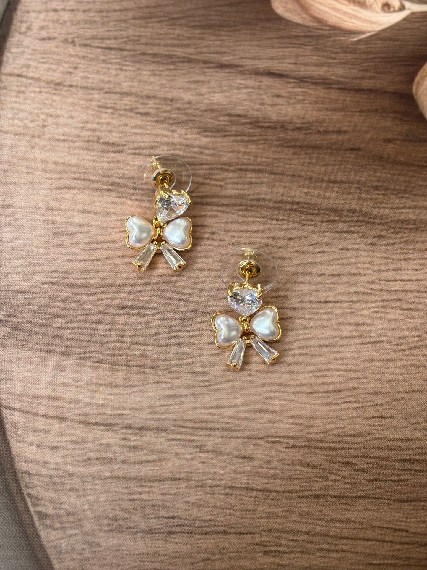 Heart AD pearly bow dangler earrings