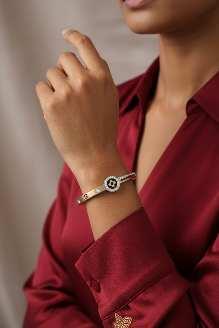 Black motif studded golden kada