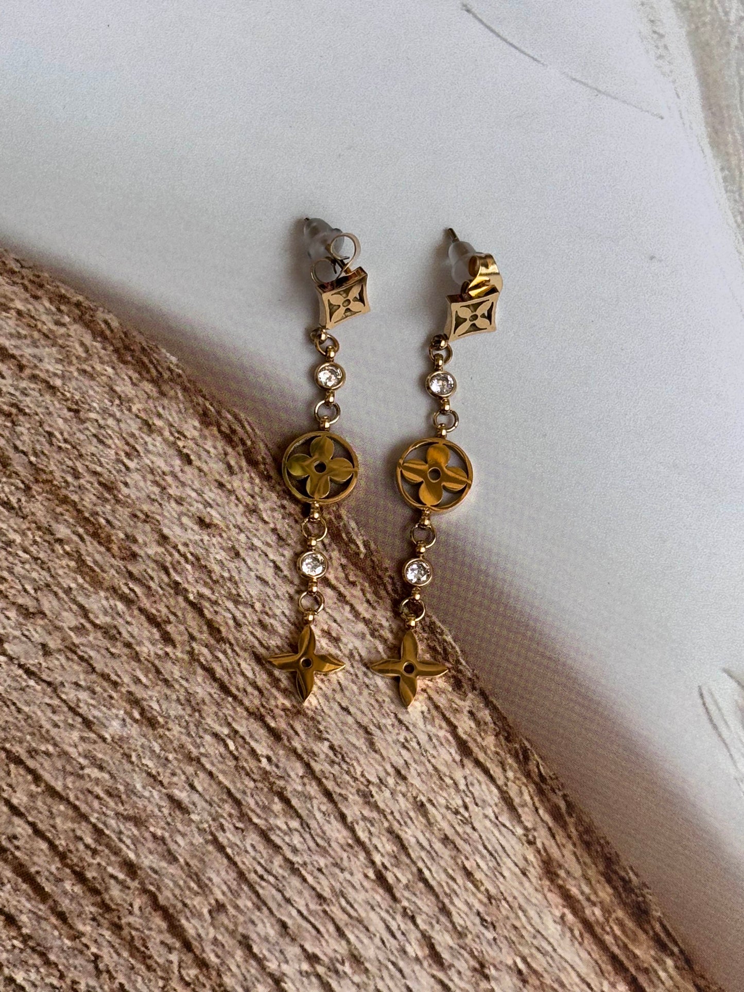 LV.. Dangler earring