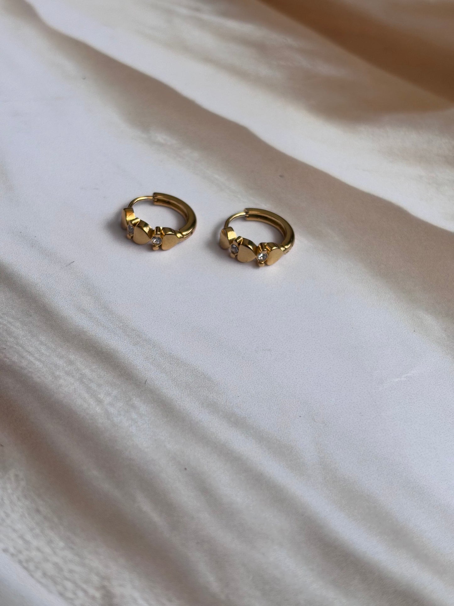 Heart button huggie earrings