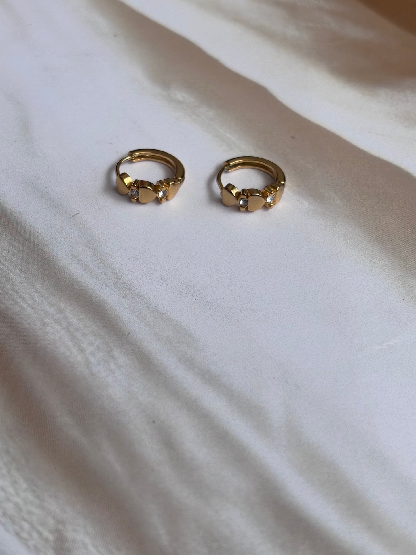 Heart button huggie earrings