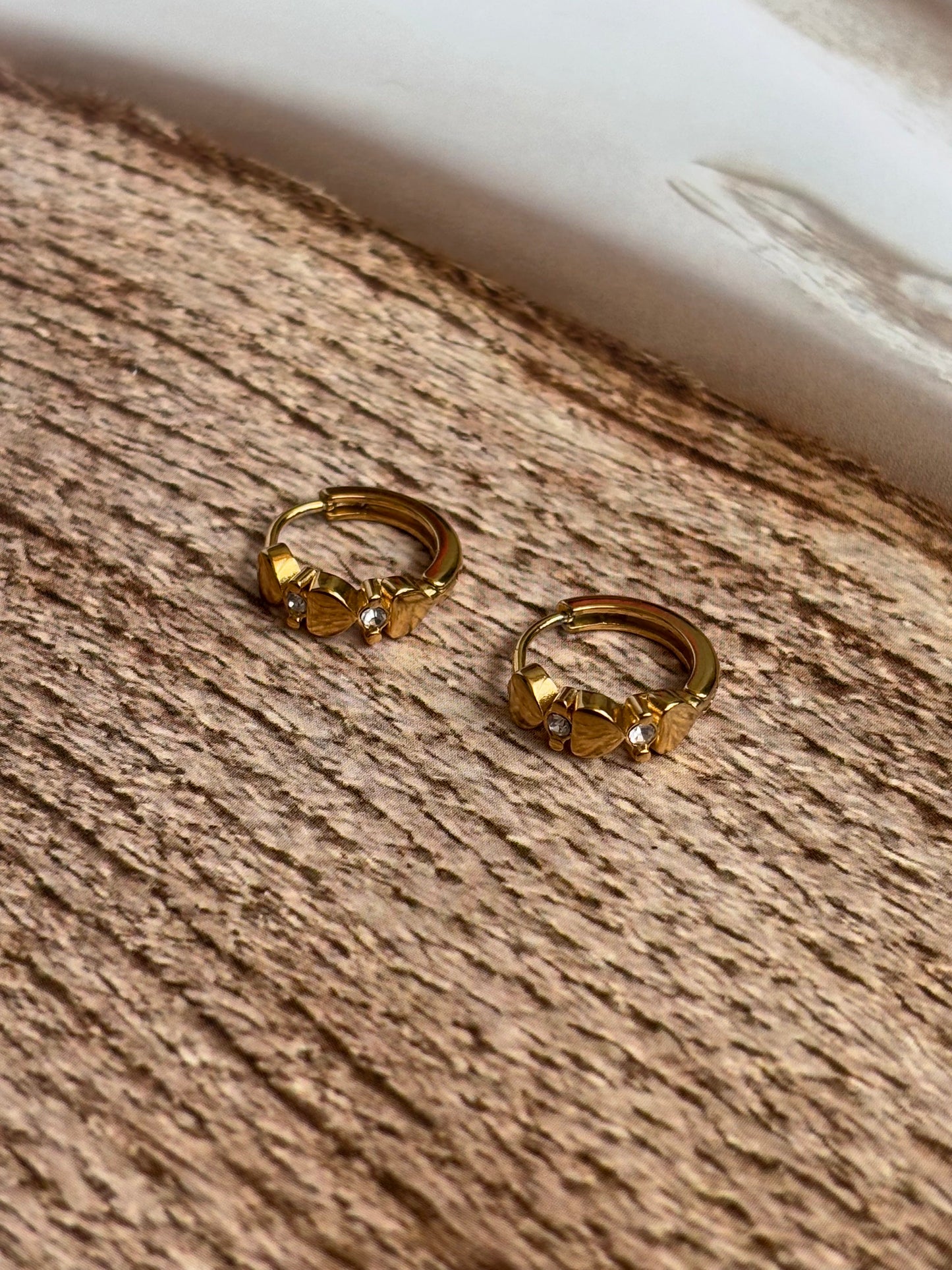 Heart button huggie earrings