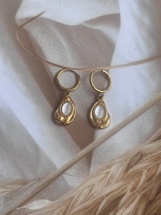 Golden white drop huggie dangler