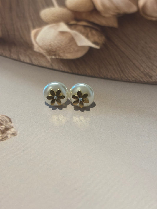 White stud with flower