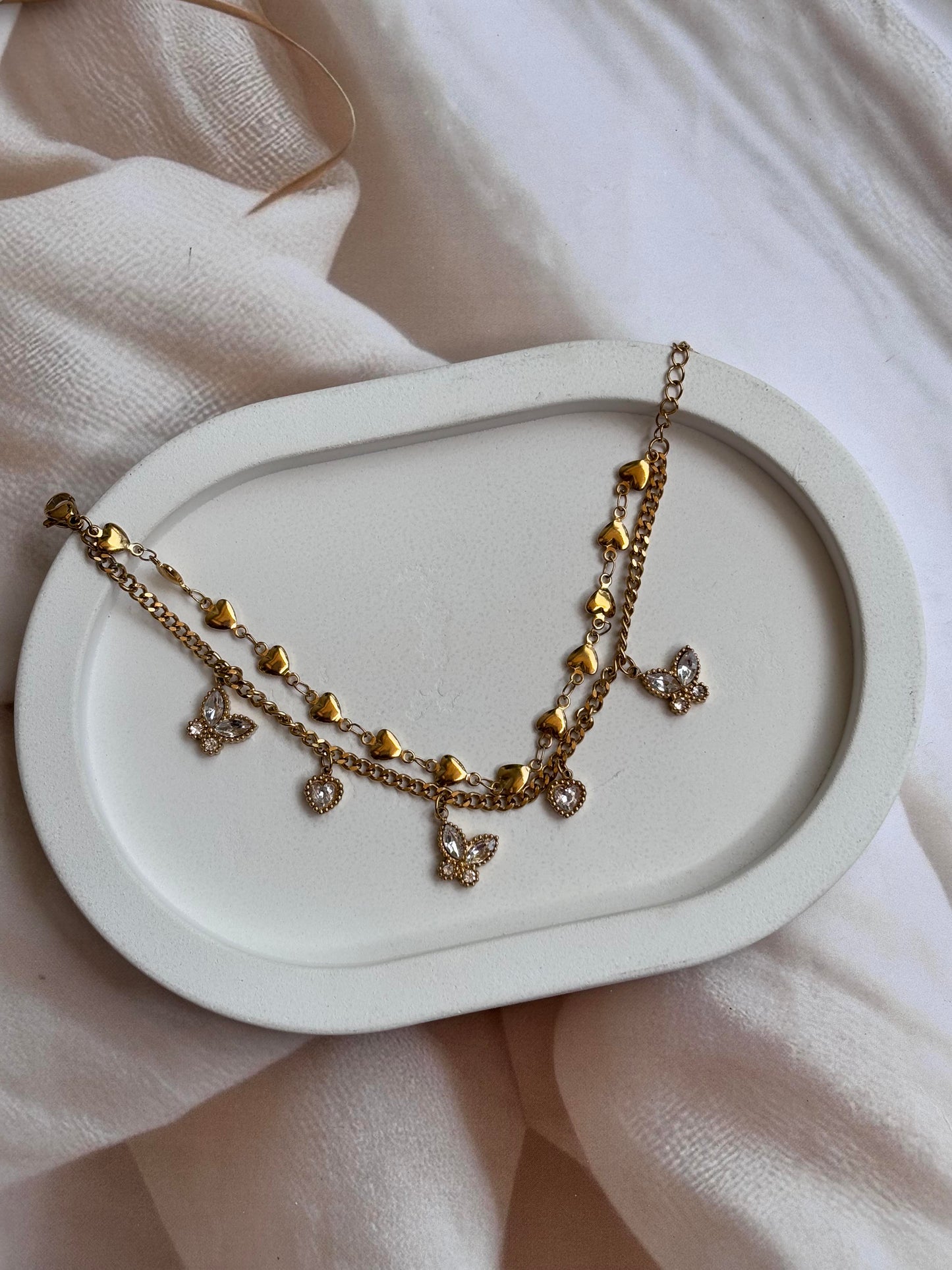 AD butterfly and heart charms layered loose bracelet