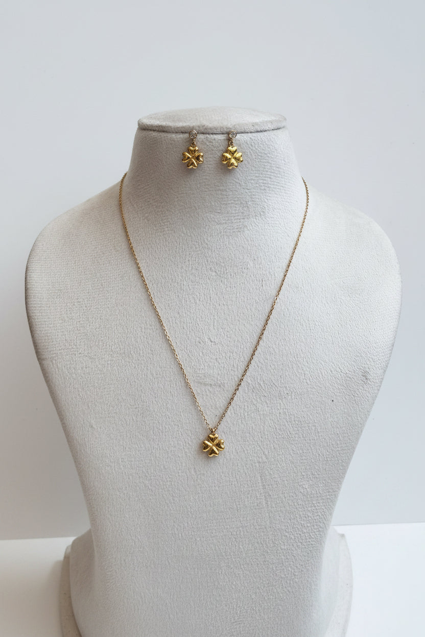 Golden flower with dangling earring chain pendant set