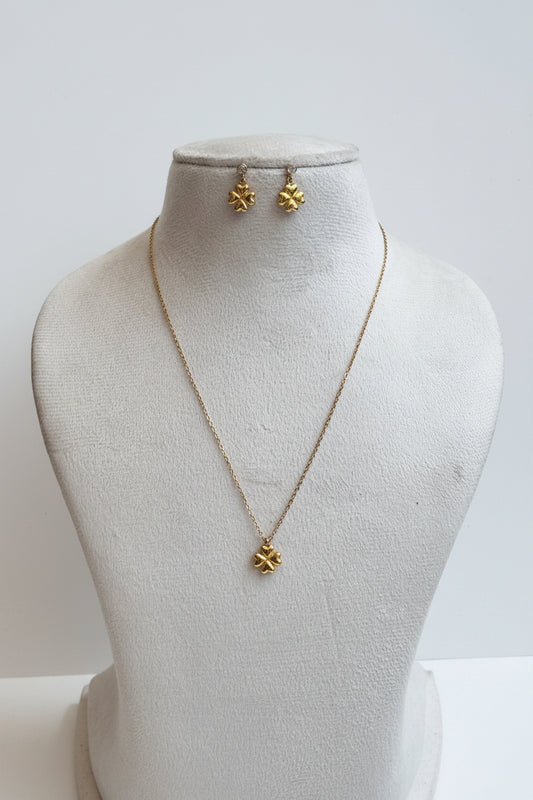 Golden flower with dangling earring chain pendant set