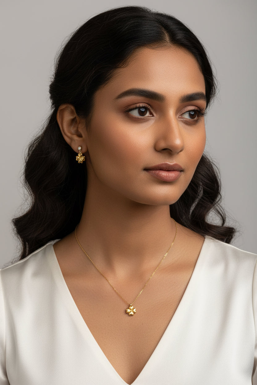 Golden flower with dangling earring chain pendant set
