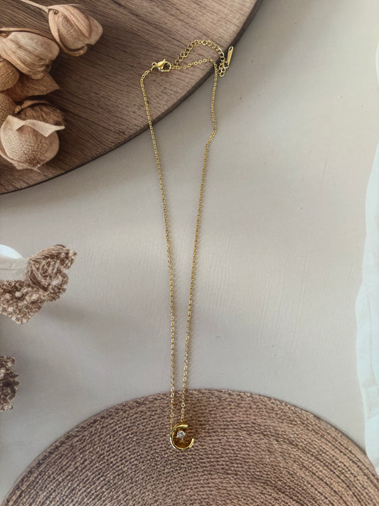 Golden half moon pendant necklace