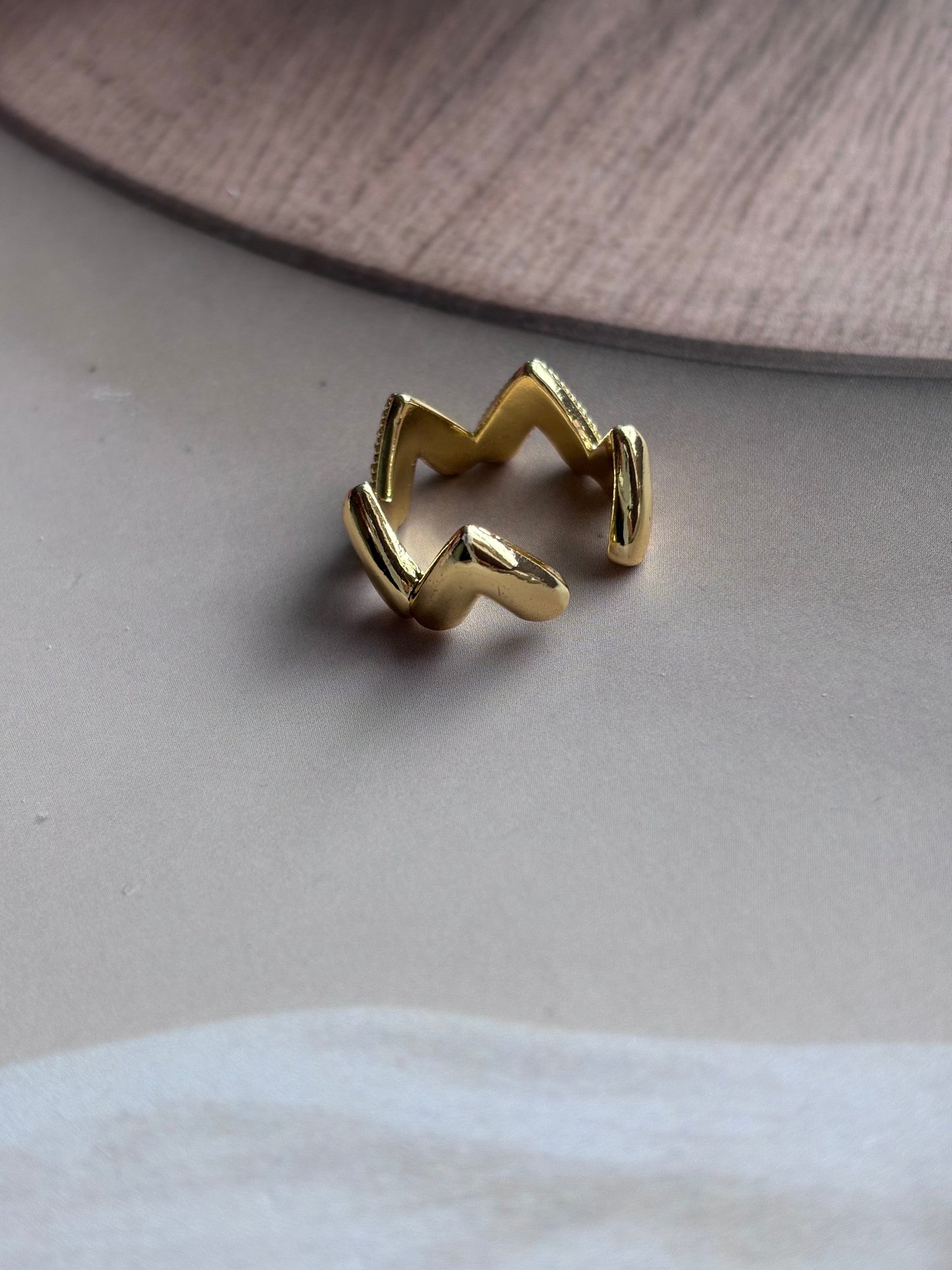 Triangular heart studded ring