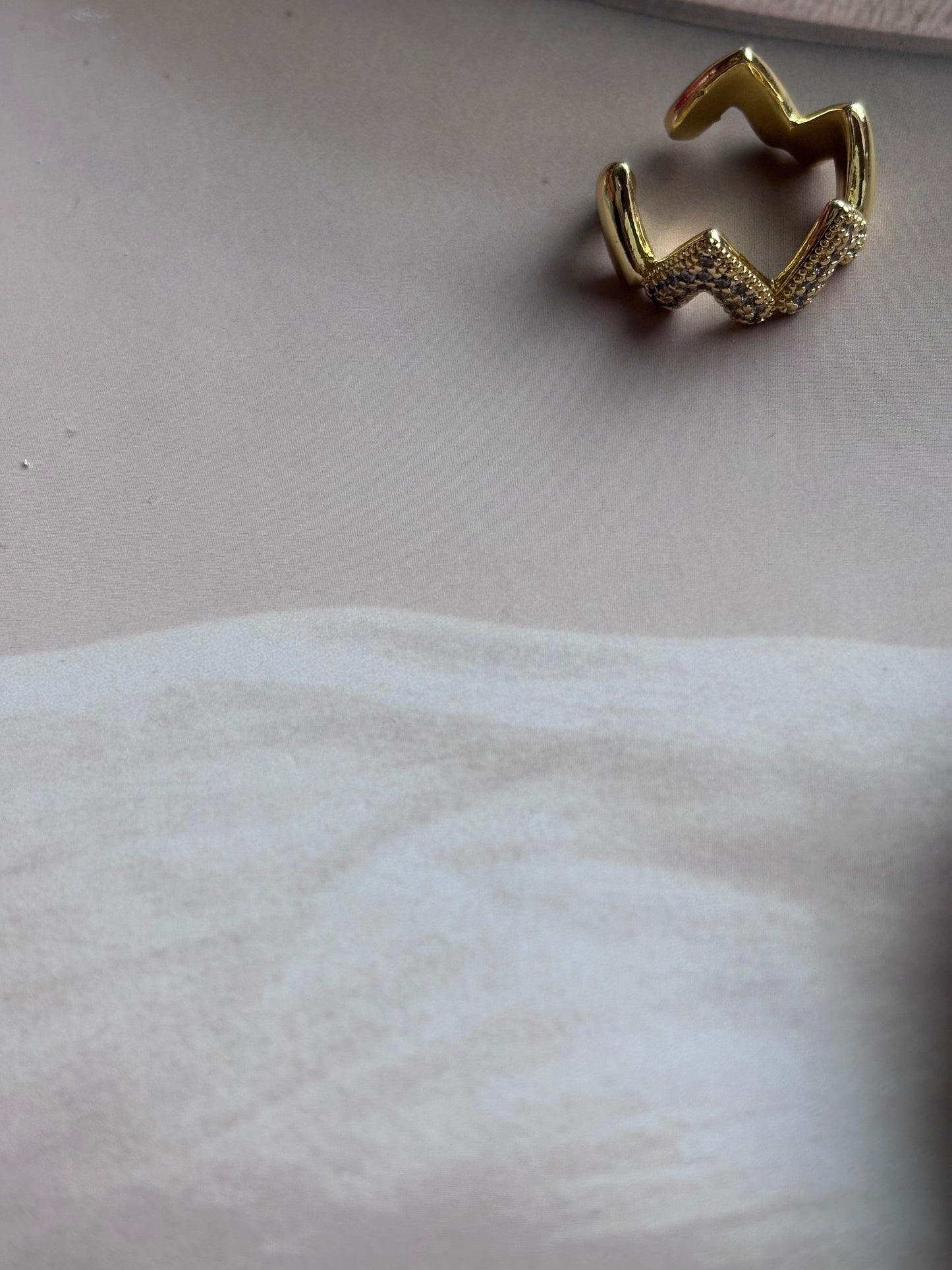 Triangular heart studded ring