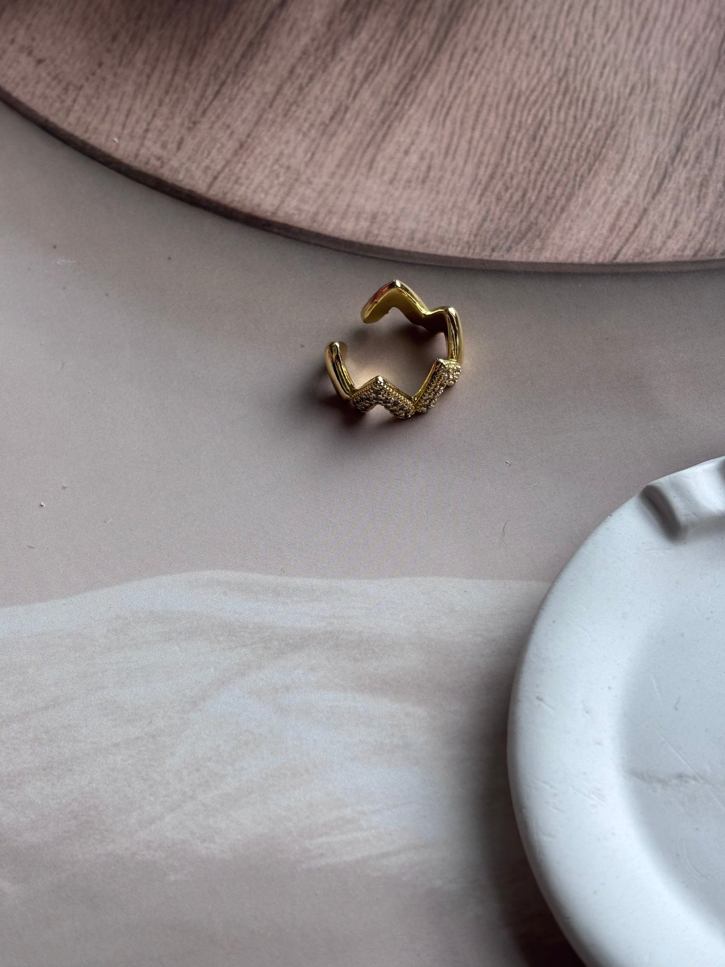 Triangular heart studded ring