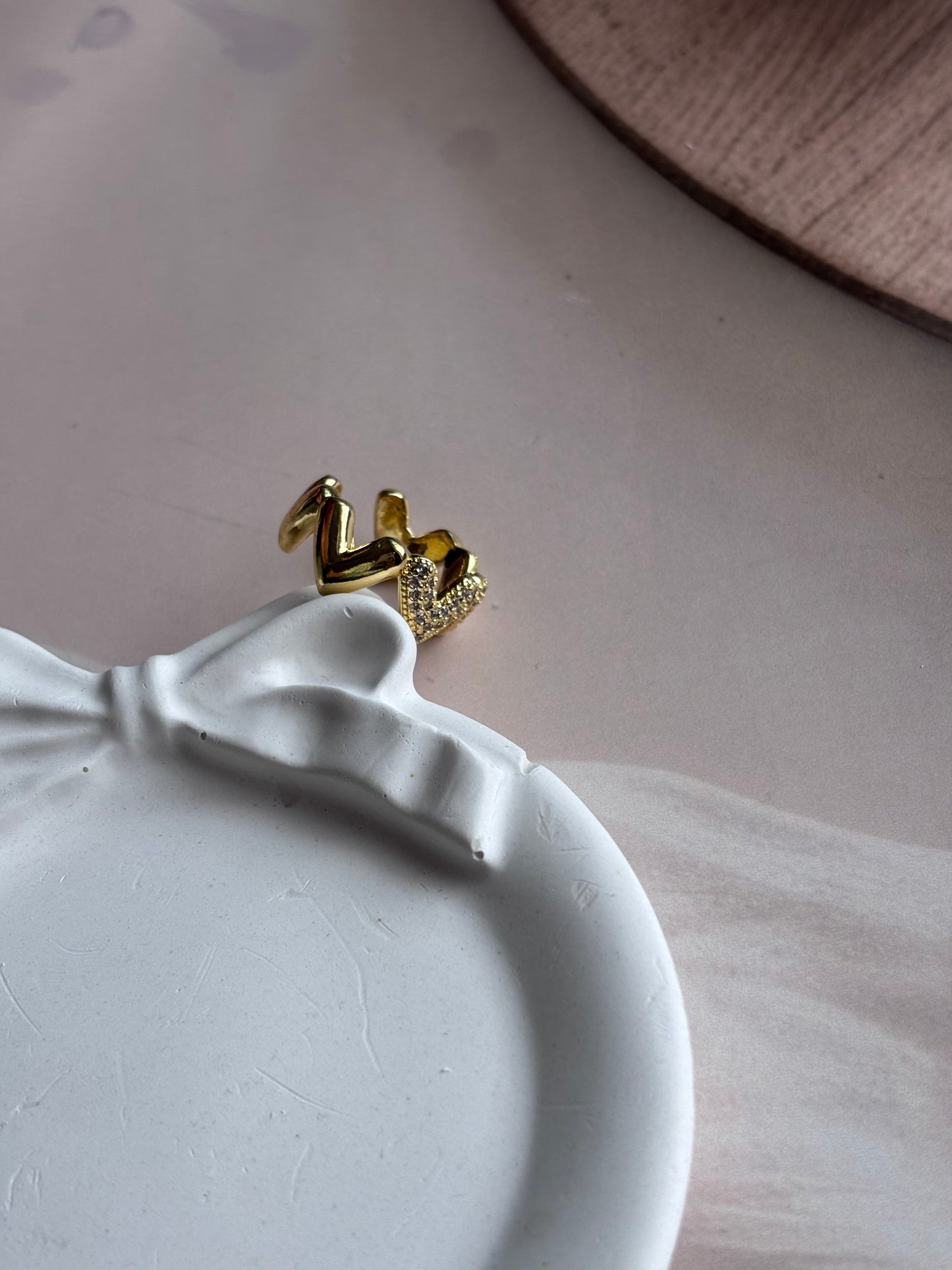 Triangular heart studded ring