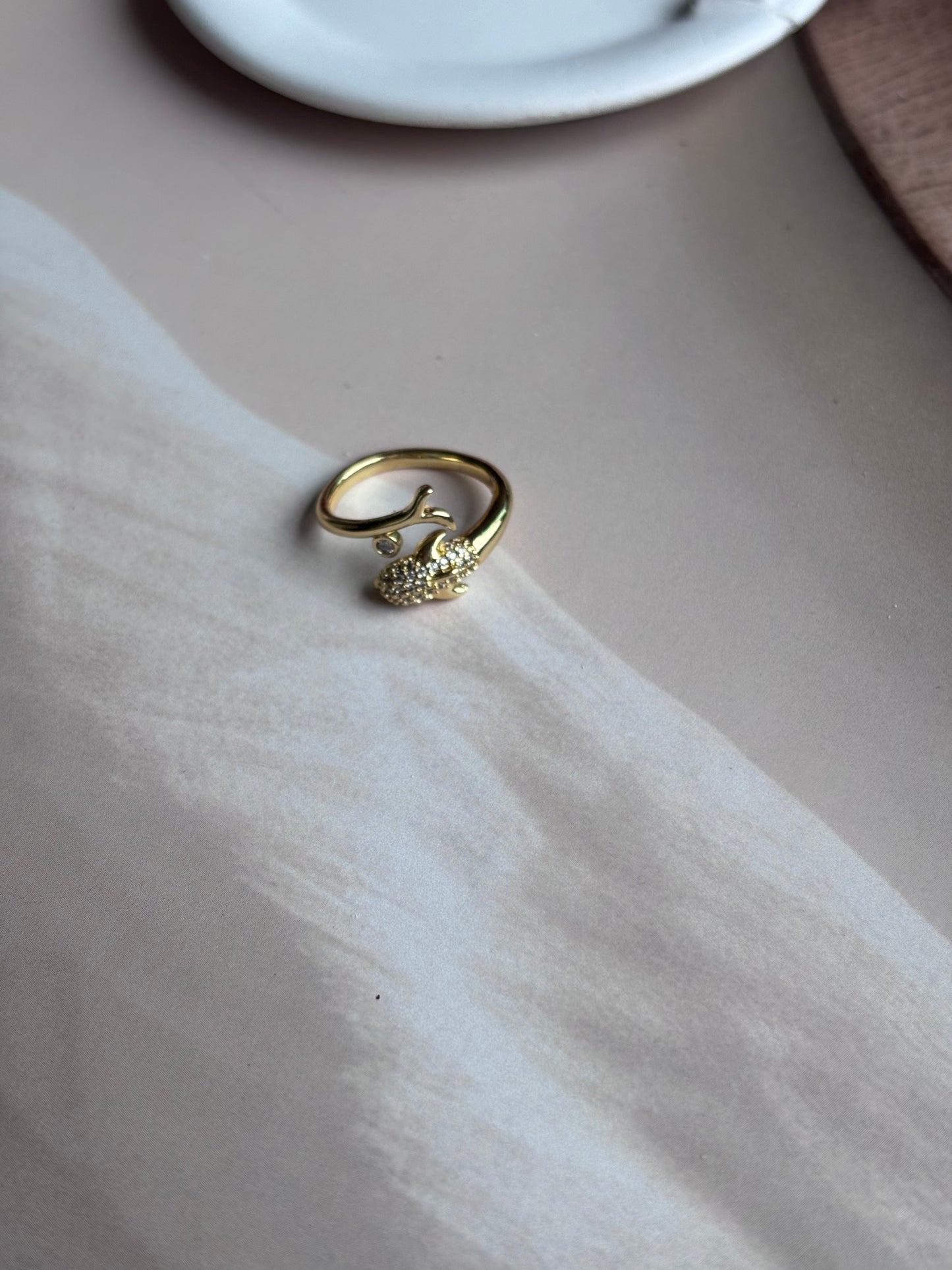 Dolphin ring, studded