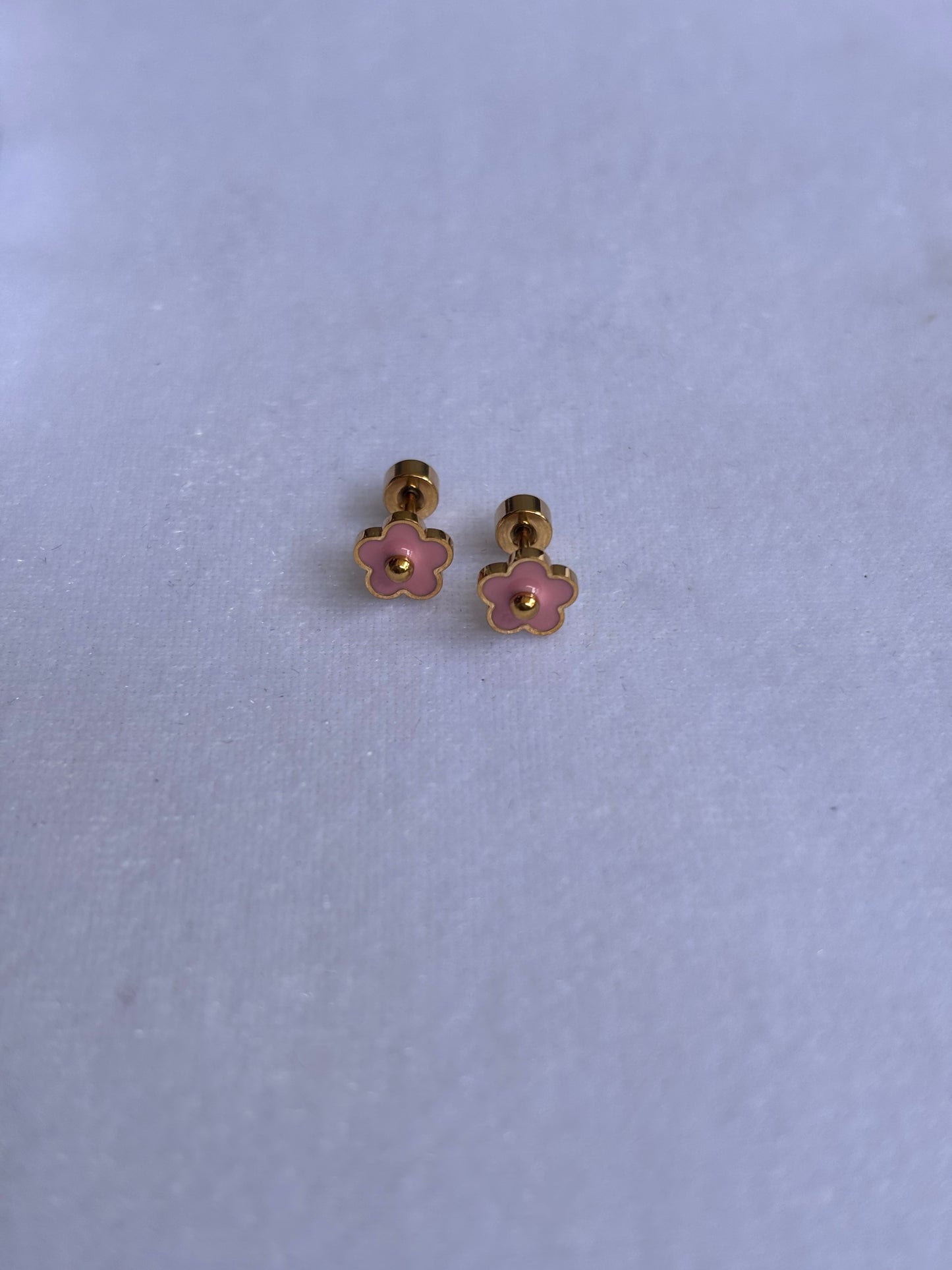 Pink flower with golden dot