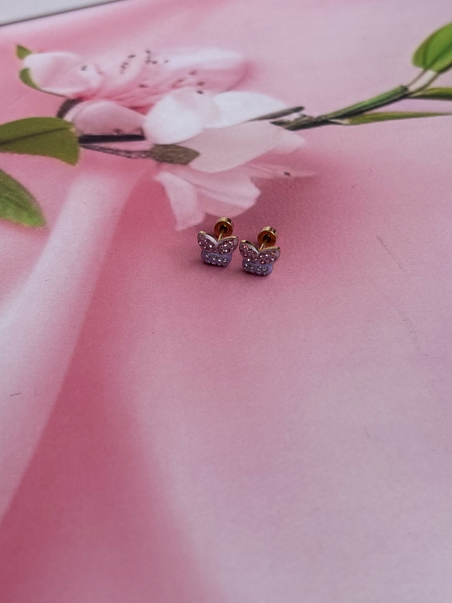 Lilac pinky butterfly studs