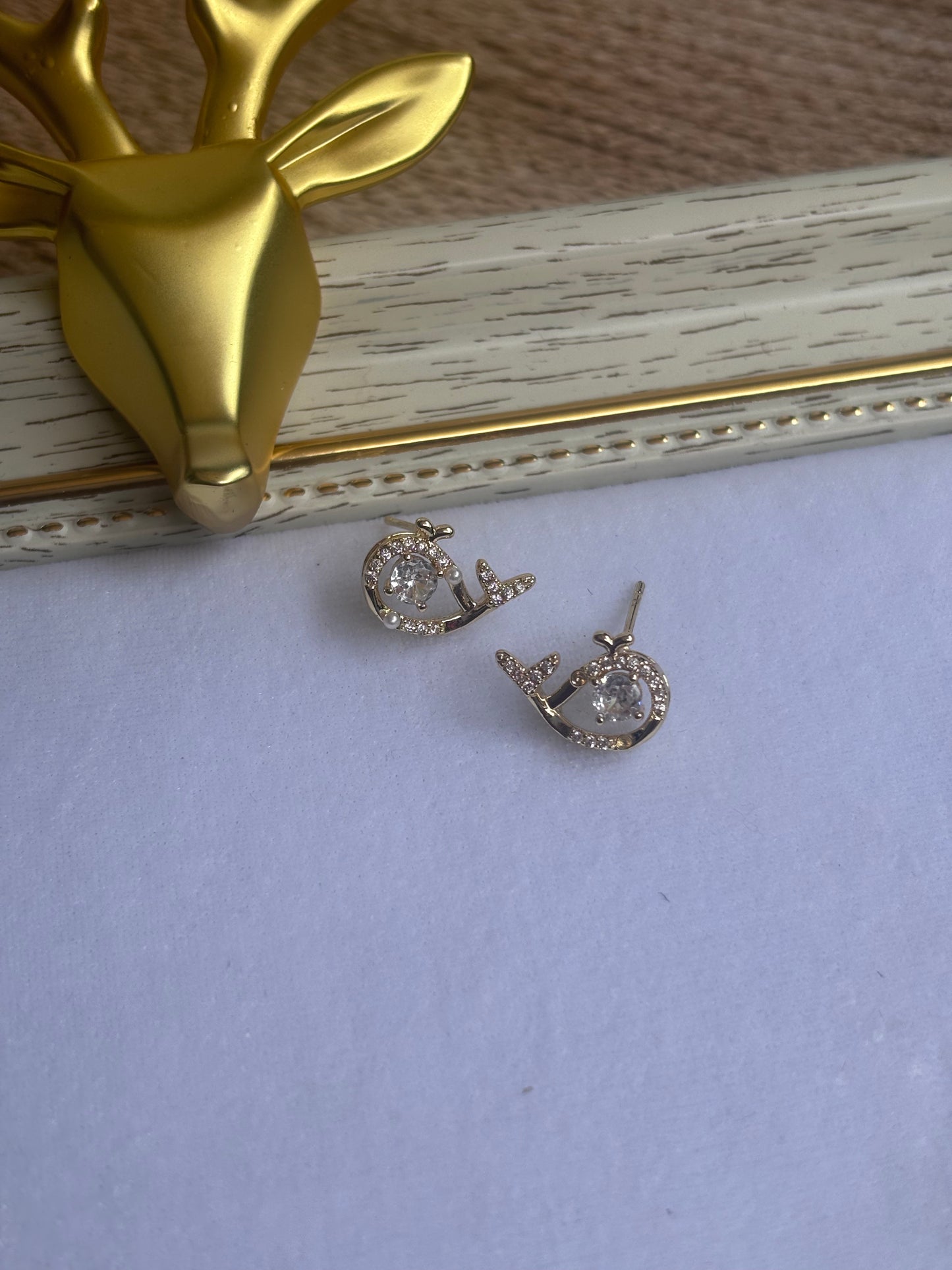 White stone Dolphin studs