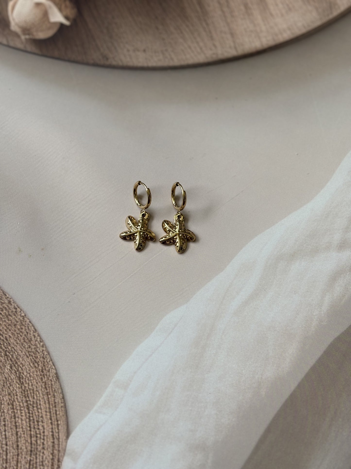 Golden starfish earrings