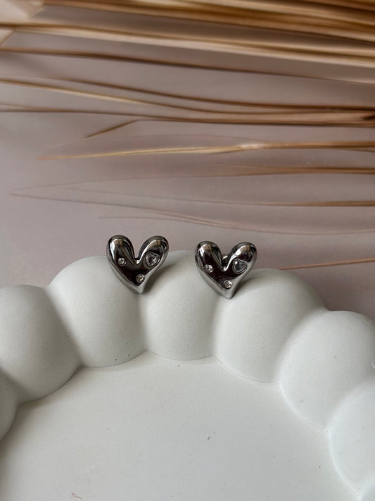 Silver plated heart shape studs with AD
