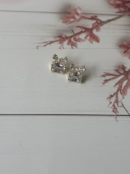 Golden bow gift studs