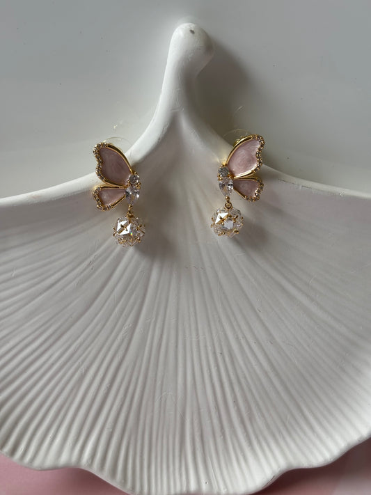 Pink half butterfly dangler earrings